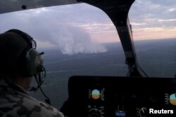 Пожежа у зоні відчуження (40 кілометрів від ЧАЕС) з висоти пташиного польоту. 29 червня 2015 року