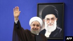 Iran -- Newly re-elected Iranian President Hassan Rouhani gestures after delivering a televised speech in the capital Tehran, May 20, 2017