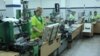 Armenia - Workers at a cigarette factory in Yerevan, 5Jun2014.