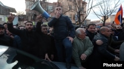 Armenia -- Opposition leader Ishkhan Saghatelian addresses protesters outside the parliament building in Yerevan, March 9, 2021.