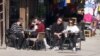 Bosnia and Herzegovina, Sarajevo, Citizens of Sarajevo in a cafe in the old part of the city, February 23, 2021