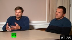 Аляксандр Пятроў і Руслана Башыраў у эфіры тэлеканала Russia Today