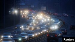 UKRAINE - Cars drive towards the exit of Kyiv after Russian President Vladimir Putin authorized a military operation in eastern Ukraine, February 24, 2022.