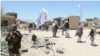 Taliban fighters patrol in the central Afghan province of Ghazni in May 2017.
