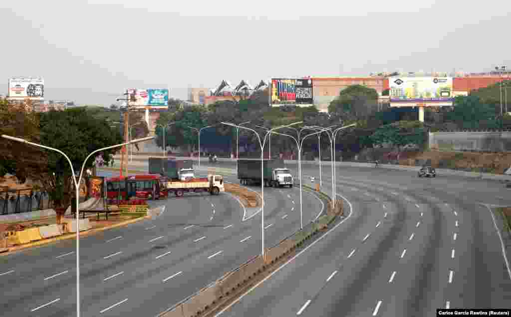 Vehicles are seen blocking the highway near the Generalisimo Francisco de Miranda Air Base. 