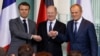Emmanuel Macron, Olaf Scholz i Donald Tusk na konferenciji za novinare u Berlinu 15. marta 2024.