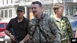 Ігар Стралкоў-Гіркін у Данецку яшчэ ў якасьці кіраўніка прарасейскіх сэпаратыстаў, ліпень 2014