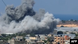 Smoke billows after an Israeli air strike in Rafah in the Gaza Strip on October 16. The recent outbreak of hostilities in the region could benefit both China and Russia.