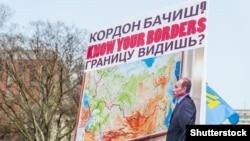 Плакат на акції протесту проти агресії Росії щодо України. Вашингтон, 6 березня 2014 року