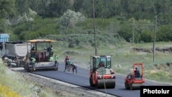 Armenia -- Workers rebuild a road in Gegharkunik province, Juy 4, 2020.