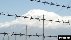 Armenia -- Barbed wire, pictured against the backdrop of Mount Ararat, marks Armenia's closed border with Turkey