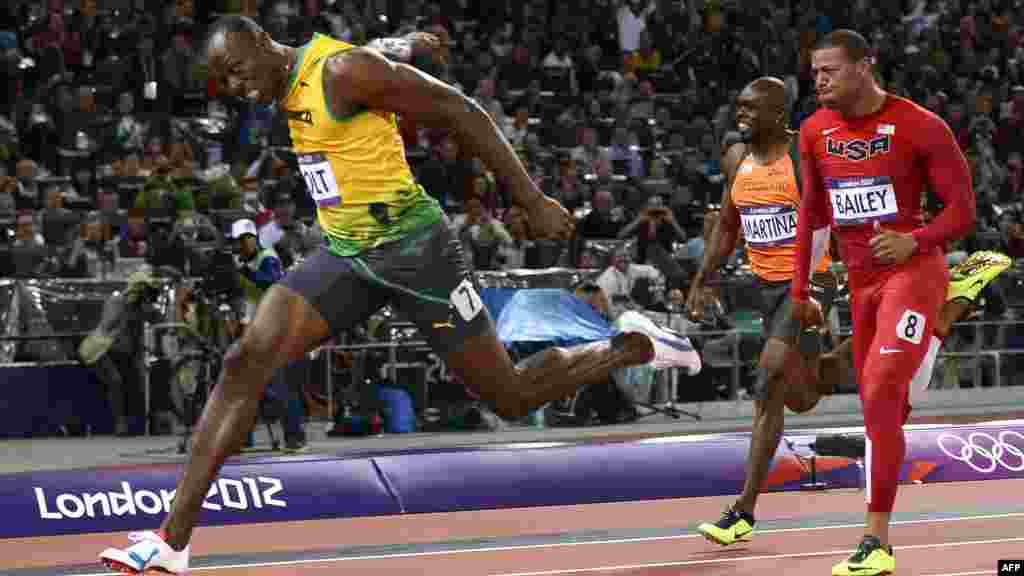 Usain Bolt u trci na 100 metara, London, 5. august 2012.
